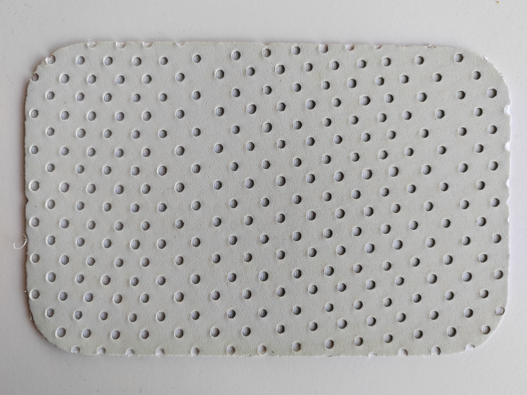 White Perforated Fabric