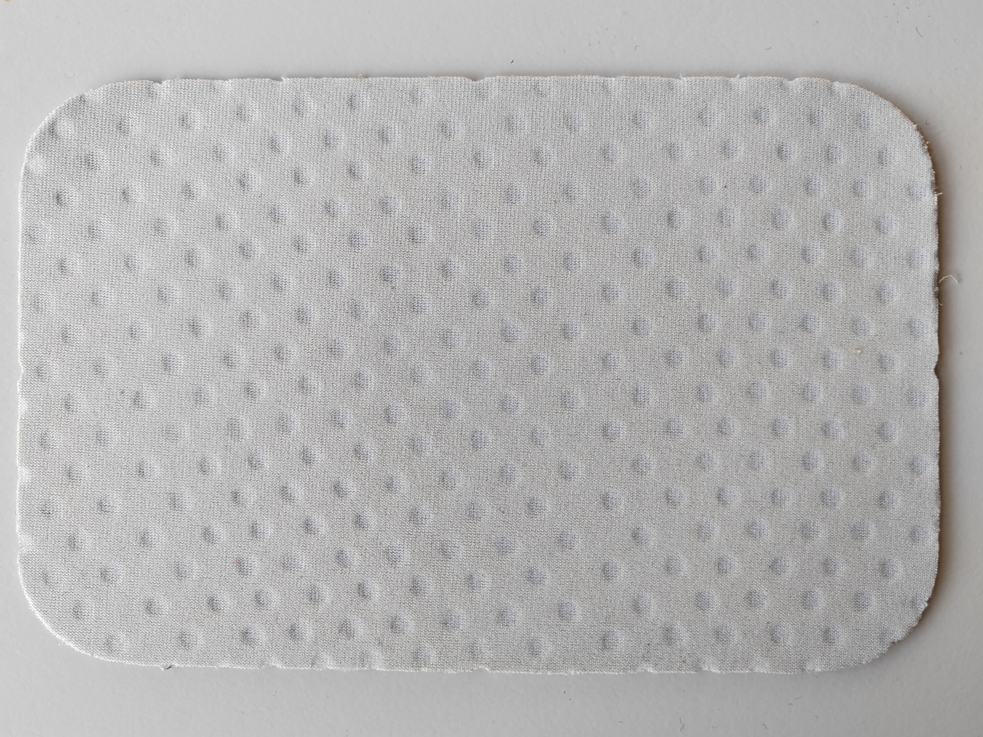 White Perforated Fabric